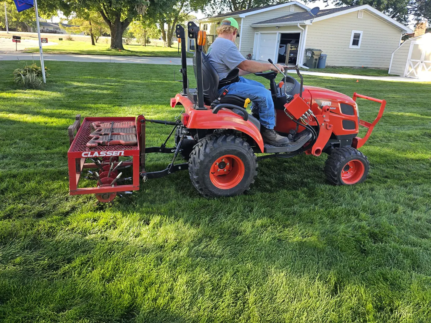 Aerating the ground for enhanced grass growth.  